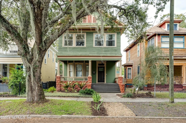 view of front of property featuring covered porch