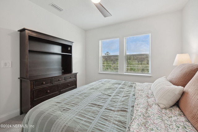 bedroom featuring ceiling fan and carpet floors