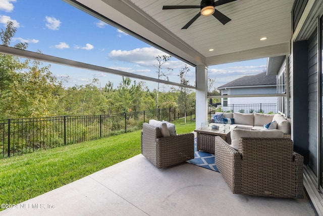 view of patio with an outdoor living space and ceiling fan