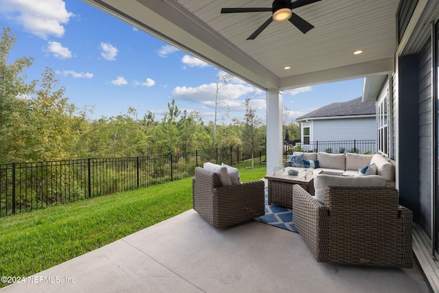 view of patio / terrace featuring an outdoor living space and ceiling fan