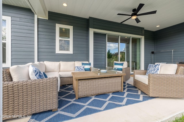 view of patio featuring an outdoor living space and ceiling fan