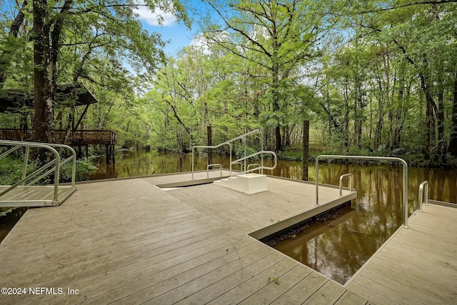 view of dock with a water view