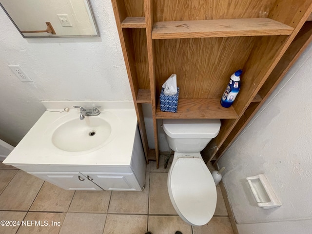 bathroom featuring tile patterned floors, vanity, toilet, and wooden ceiling