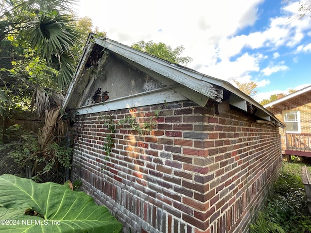 view of home's exterior featuring a deck