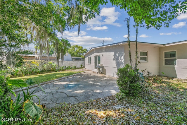 rear view of property with a patio area