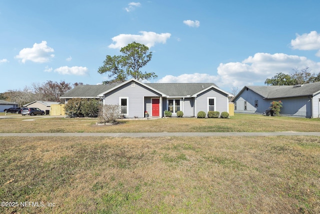 ranch-style home with a front yard