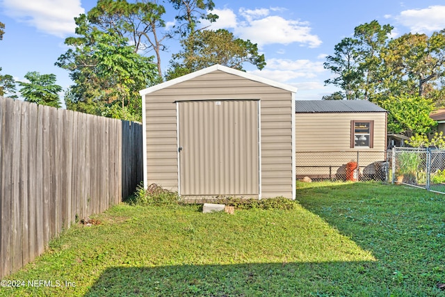 view of outdoor structure with a yard