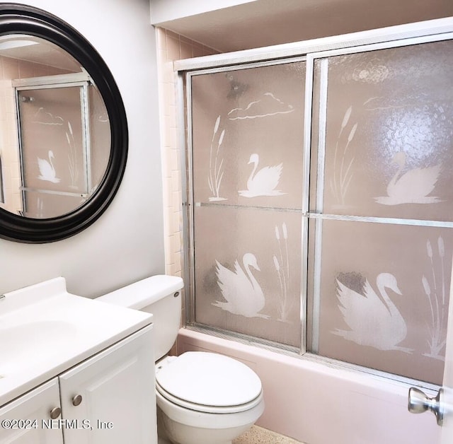 full bathroom featuring vanity, toilet, and enclosed tub / shower combo