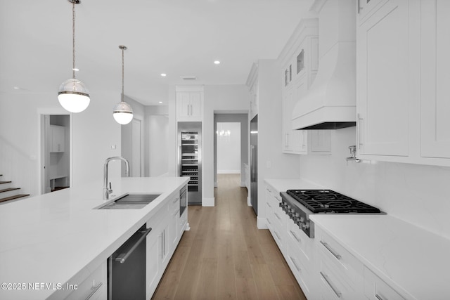 142 Ocean Blvd, Atlantic Beach, FL 32233 - kitchen with custom range hood, stainless steel appliances, white cabinets, and recessed lighting