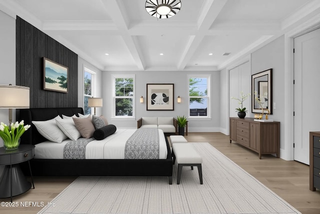 142 Ocean Blvd, Atlantic Beach, FL 32233 - bedroom with light wood-style flooring, coffered ceiling, beamed ceiling, recessed lighting, and ornamental molding