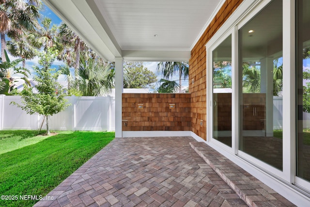 142 Ocean Blvd, Atlantic Beach, FL 32233 - fenced backyard featuring a patio area