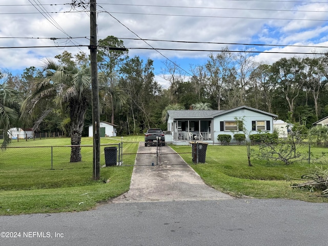 view of front of property with a front yard and a porch