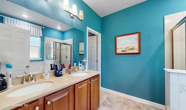 bathroom featuring vanity and walk in shower