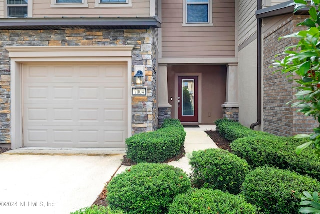 entrance to property with a garage