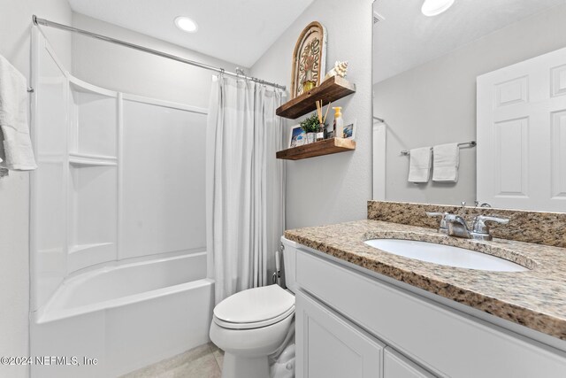 full bathroom with tile patterned flooring, vanity, toilet, and shower / bathtub combination with curtain