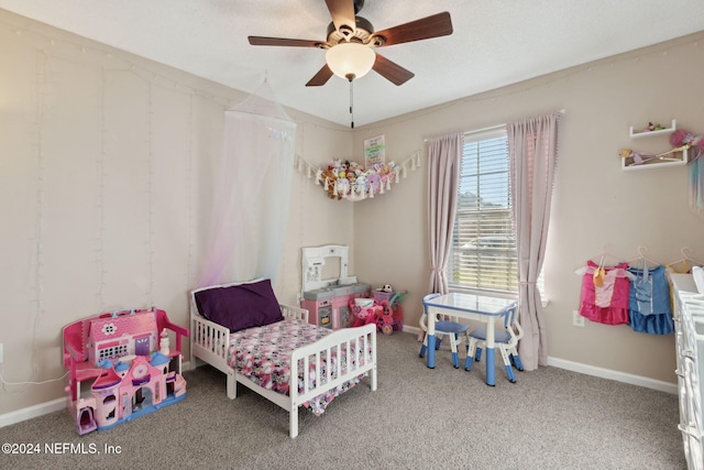 bedroom with ceiling fan and carpet