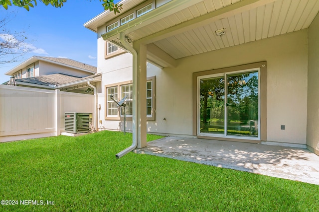 exterior space featuring a patio area and a lawn