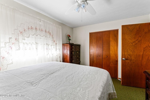 carpeted bedroom featuring a closet and ceiling fan