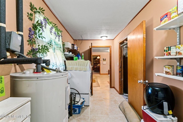 interior space with gas water heater, a textured ceiling, and light tile patterned floors