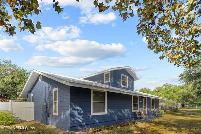 view of property exterior featuring a yard