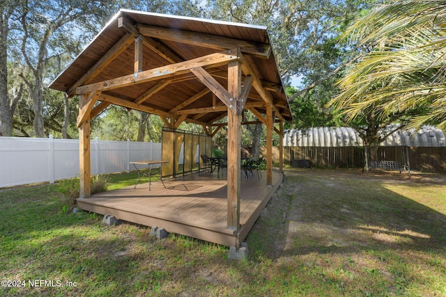 view of yard with a wooden deck