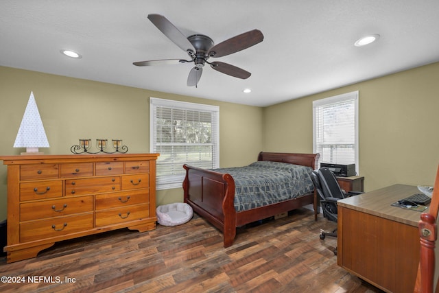 bedroom featuring ceiling fan and dark hardwood / wood-style flooring