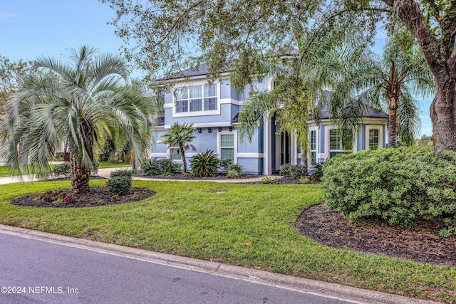 view of front of property with a front lawn