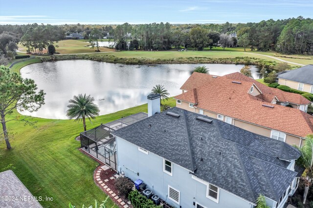 bird's eye view with a water view