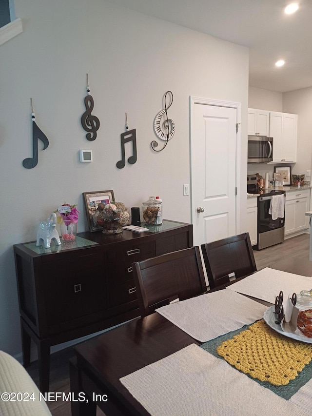 dining room featuring dark wood-type flooring