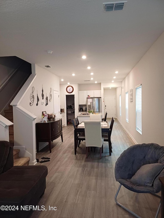 dining room featuring light wood-type flooring