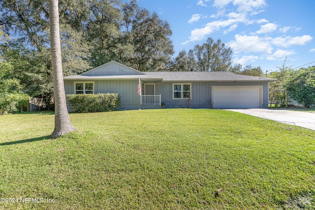 single story home with a front lawn and a garage