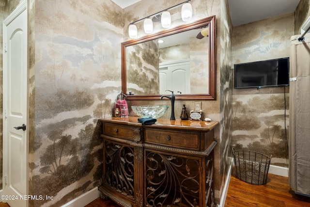 bathroom featuring wood-type flooring and vanity