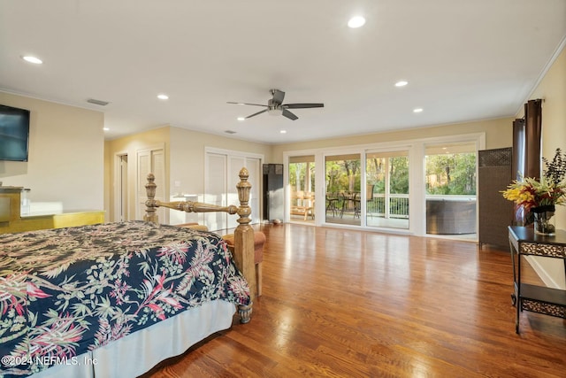 bedroom with ceiling fan, wood-type flooring, ornamental molding, and access to outside