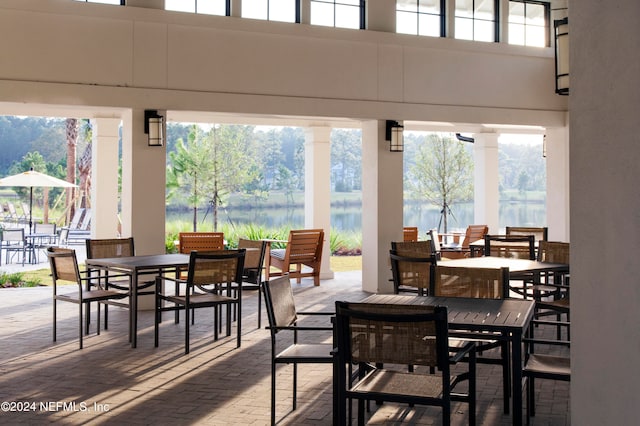 view of patio featuring a water view