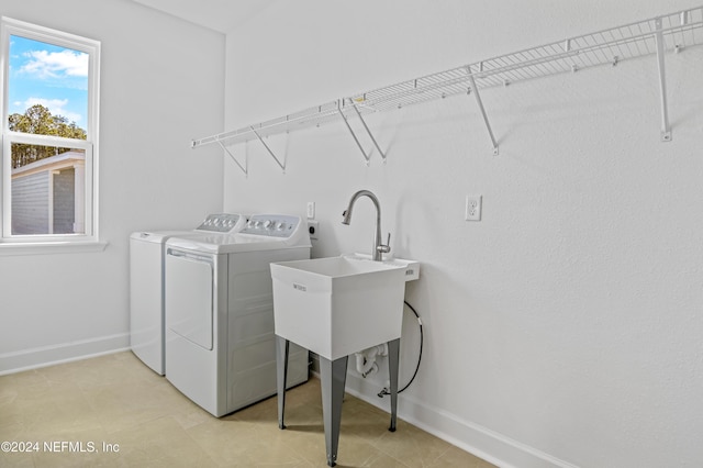 laundry area with washer and dryer