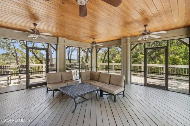 96197 Brady Point Rd, Fernandina Beach, FL 32034 - sunroom with a ceiling fan and outdoor lounge area
