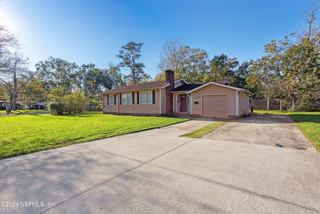 ranch-style house with a front yard and a garage