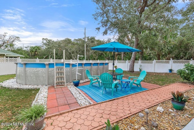 view of pool featuring a deck