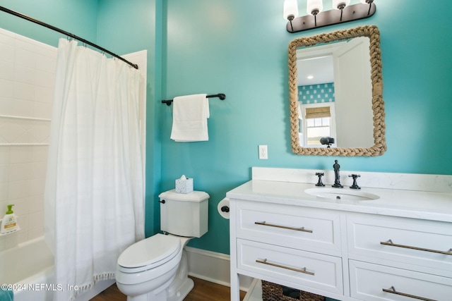 full bathroom with shower / bath combo, toilet, and vanity