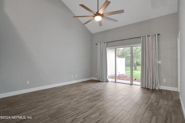 unfurnished room featuring ceiling fan, high vaulted ceiling, and dark hardwood / wood-style flooring