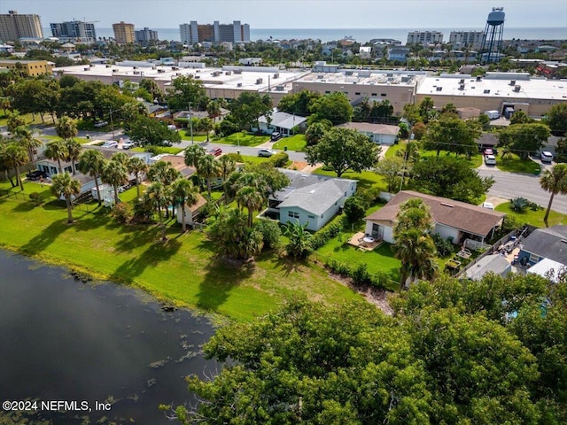 drone / aerial view featuring a water view