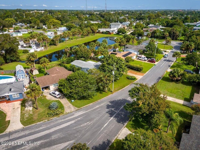 drone / aerial view with a water view