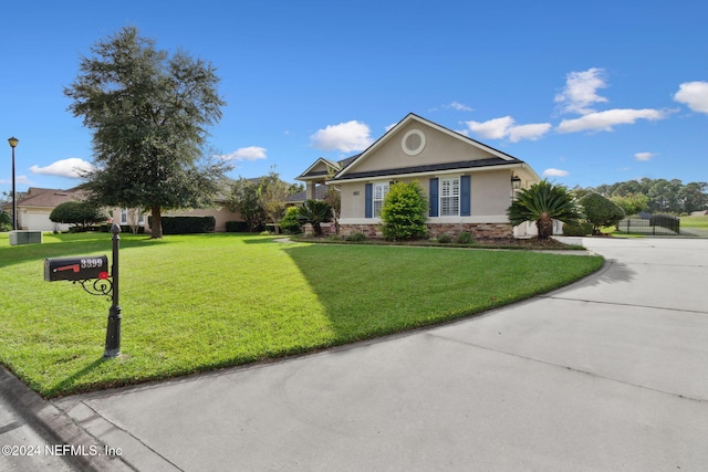 view of front of home with a front lawn