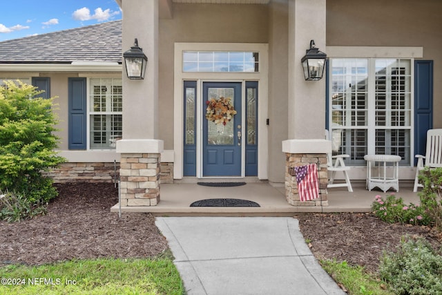 property entrance with a porch