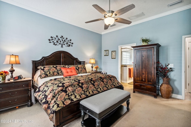 carpeted bedroom with connected bathroom, ceiling fan, and ornamental molding