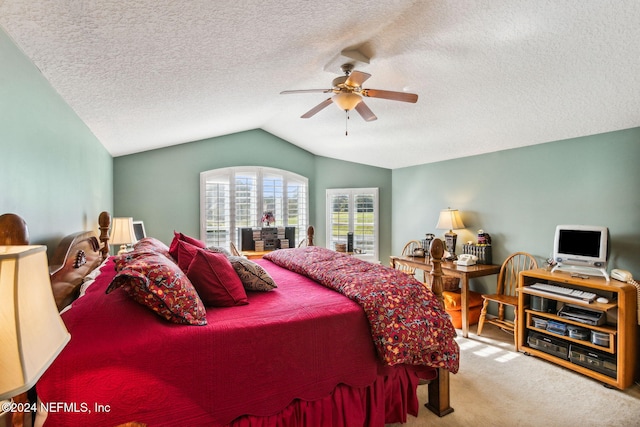 bedroom with a textured ceiling, ceiling fan, light carpet, and vaulted ceiling