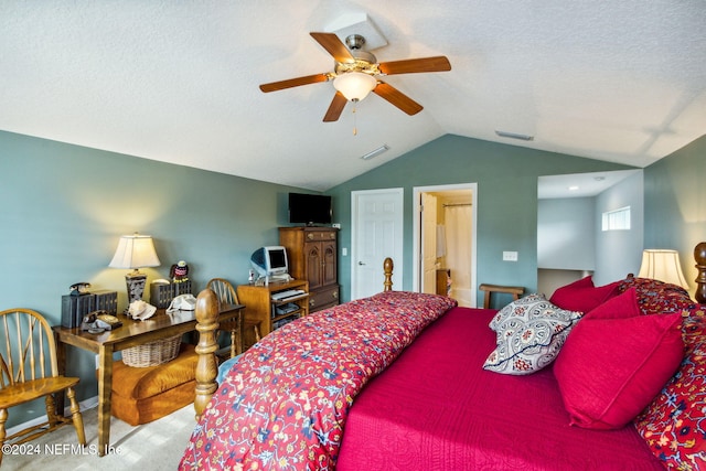 bedroom featuring connected bathroom, ceiling fan, carpet, and vaulted ceiling