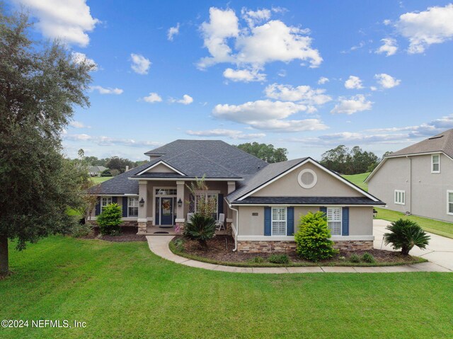 view of front of home with a front lawn