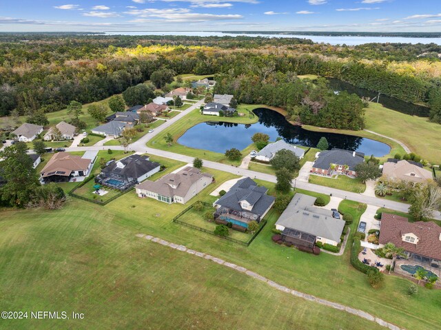 drone / aerial view featuring a water view