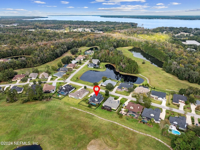 bird's eye view with a water view